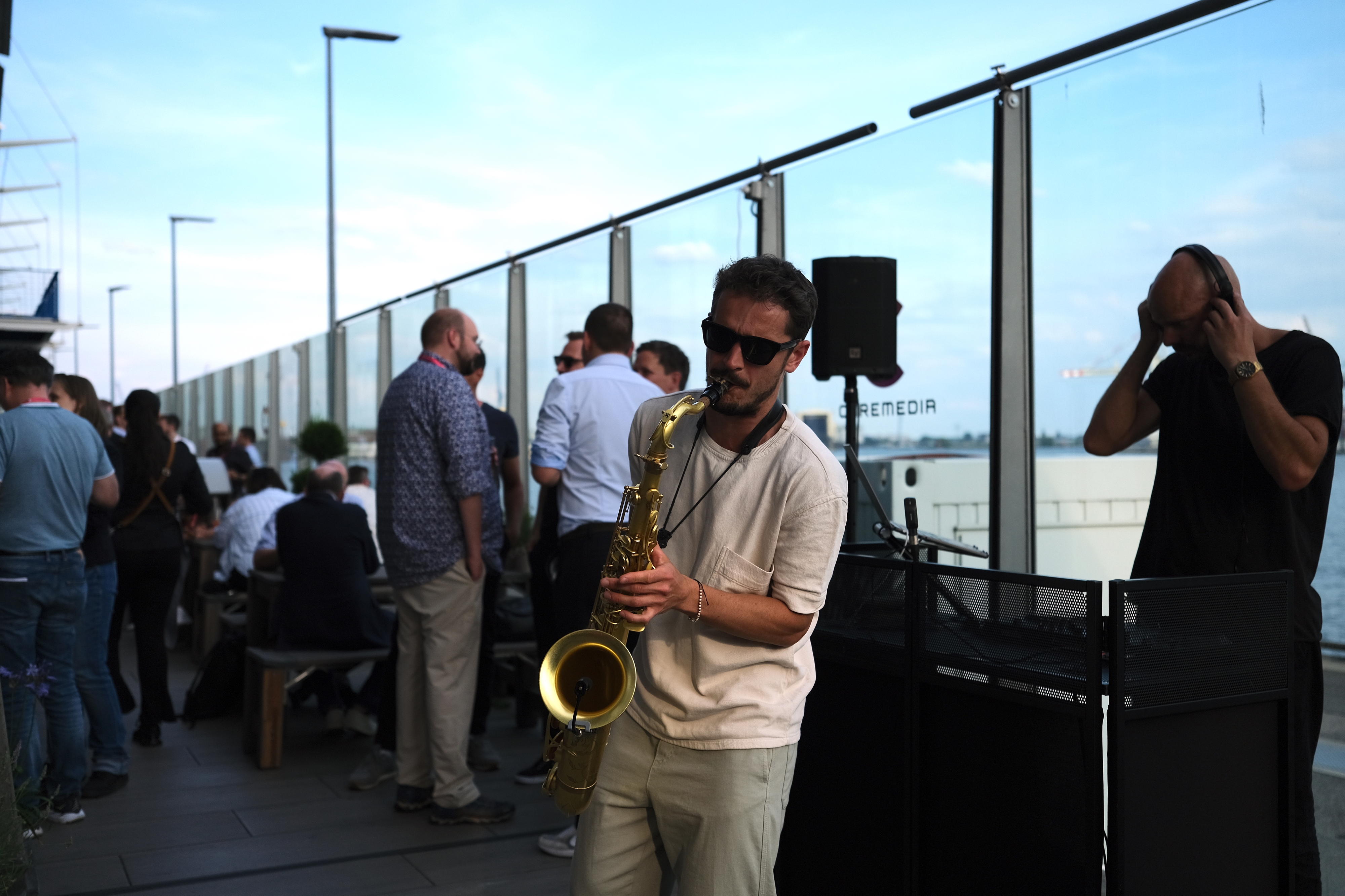 Saxophonist playing at Connect 2023